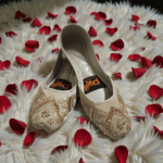 Elegant White Khusa with Intricate Golden Embroidery DC201